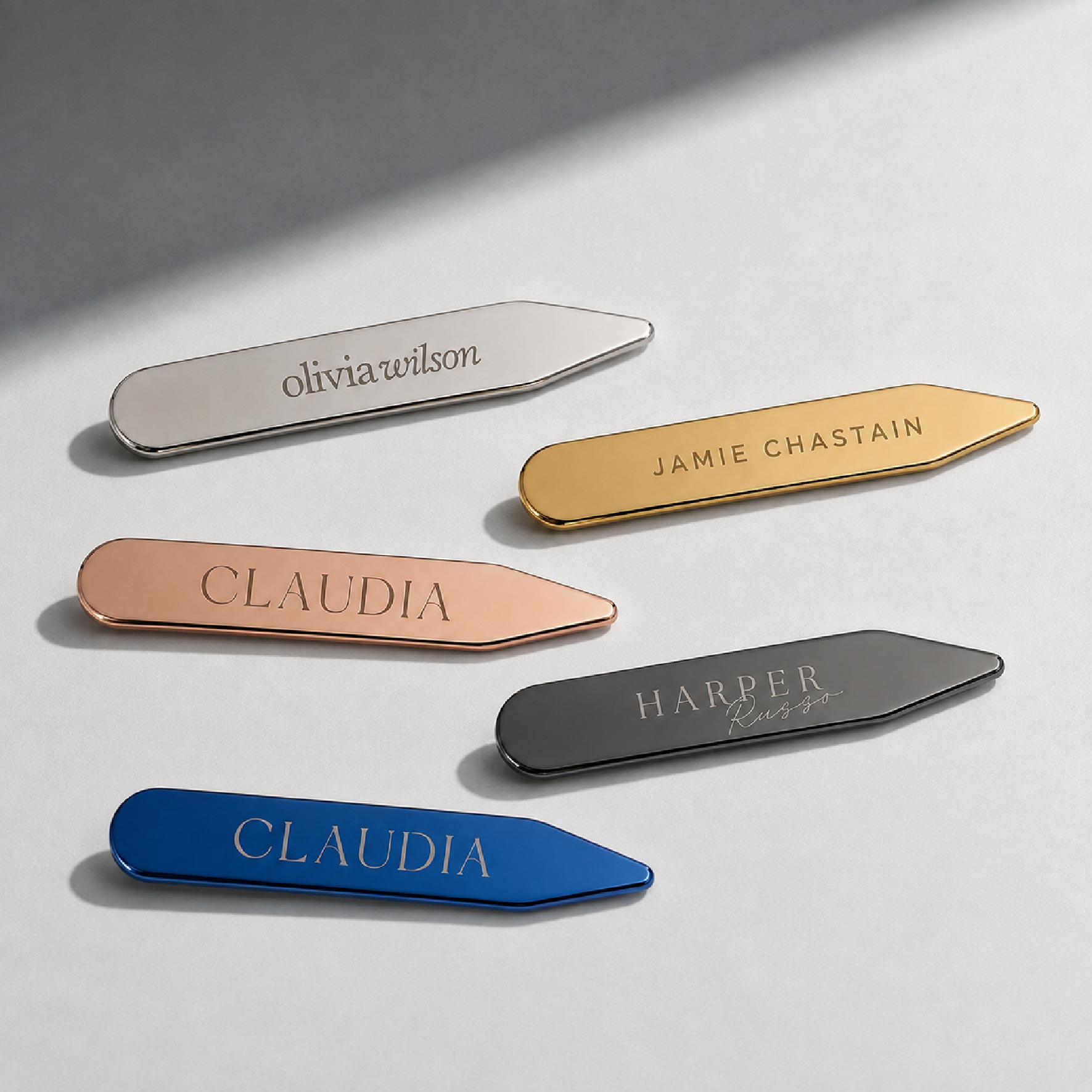 304 stainless steel collar stays with laser engraved logos in silver, gold, rose gold, gunmetal, and blue finishes