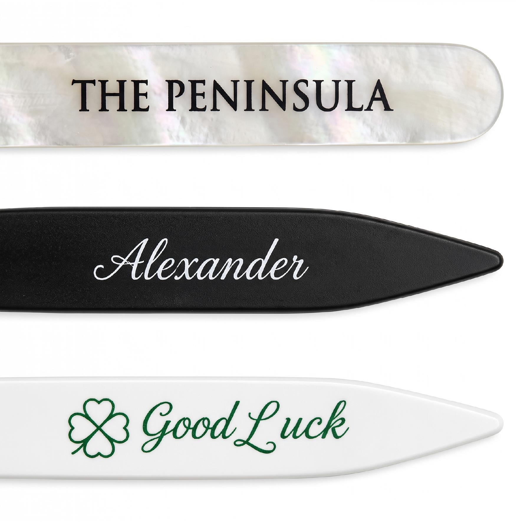 Silk screen logo examples in black, white, and green on different collar stay materials