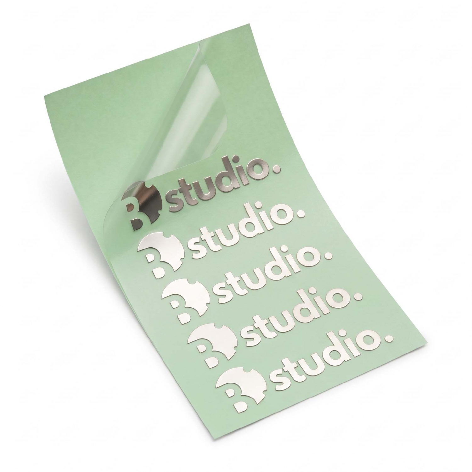 Electroformed nickel logo stickers held in place by a clear transfer film